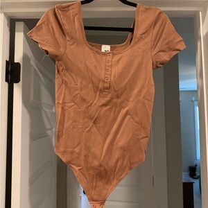 SO Ribbed Scoop Neck One-Piece Bodysuit in Tan